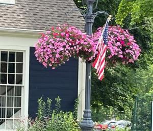 kiwanis flag and flowers